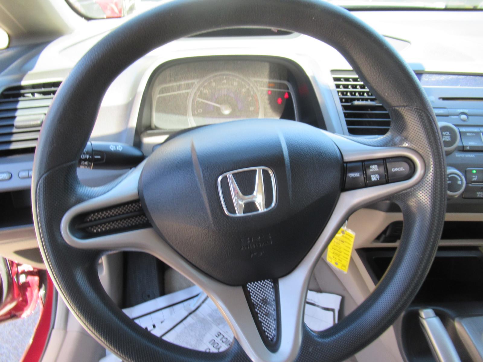 2009 Red /Tan Honda Civic LX Sedan AT (19XFA16529E) with an 1.8L L4 SOHC 16V engine, Automatic Overdrive transmission, located at 1511 North Shepherd Dr., Houston, TX, 77008, (281) 657-1221, 29.798361, -95.412560 - 2009 HONDA CIVIC LX VIN: 19XFA16529E042917 1 9 X F A 1 6 5 2 9 E 0 4 2 9 1 7 SEDAN 4 DR 1.8L I4 F SOHC 16V GASOLINE FRONT WHEEL DRIVE - Photo #2